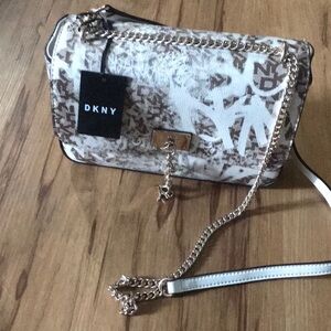 DKNY purse, pouch bag, and beanie hat